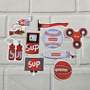 Supreme Sticker Lot 9 pk gameboy, fidget, vintage play station, baseball
